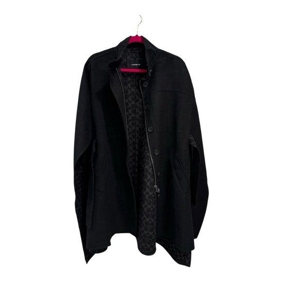 Coach Double Face Wool Cape
Comparable Value
$798 size XS-S oversized NWT - Picture 8 of 8